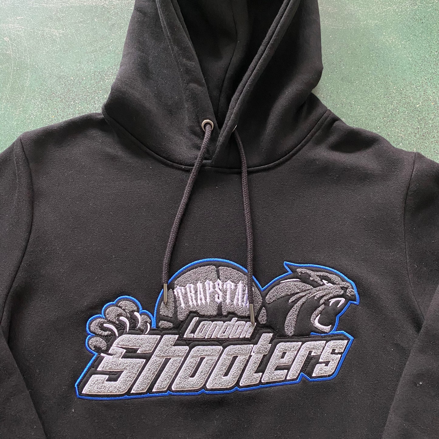 Hoodie Trapstar London Shooters Preto/Azul