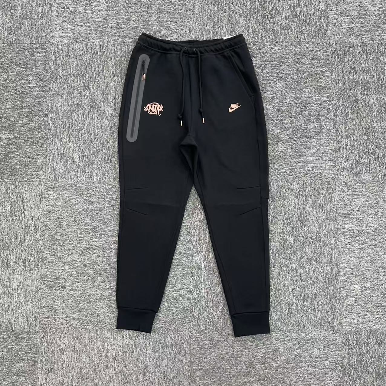 Calças Tech Fleece Nike x Syna